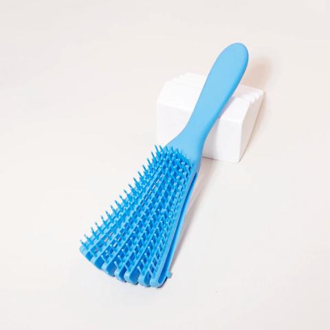 Brosse-a-cheveux-boucles-bleue