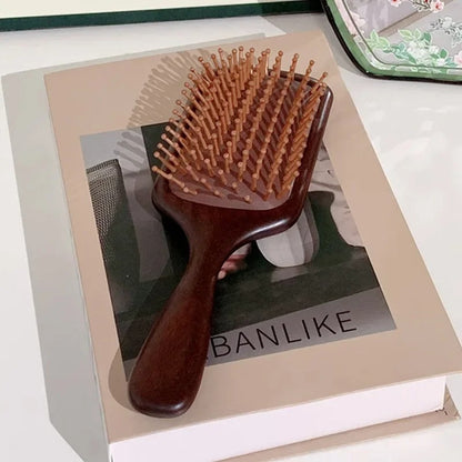Brosse-a-cheveux-masse-le-cuir-chevelu