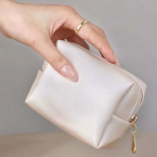 Mini trousse pour sac à main polyvalence d'usage 